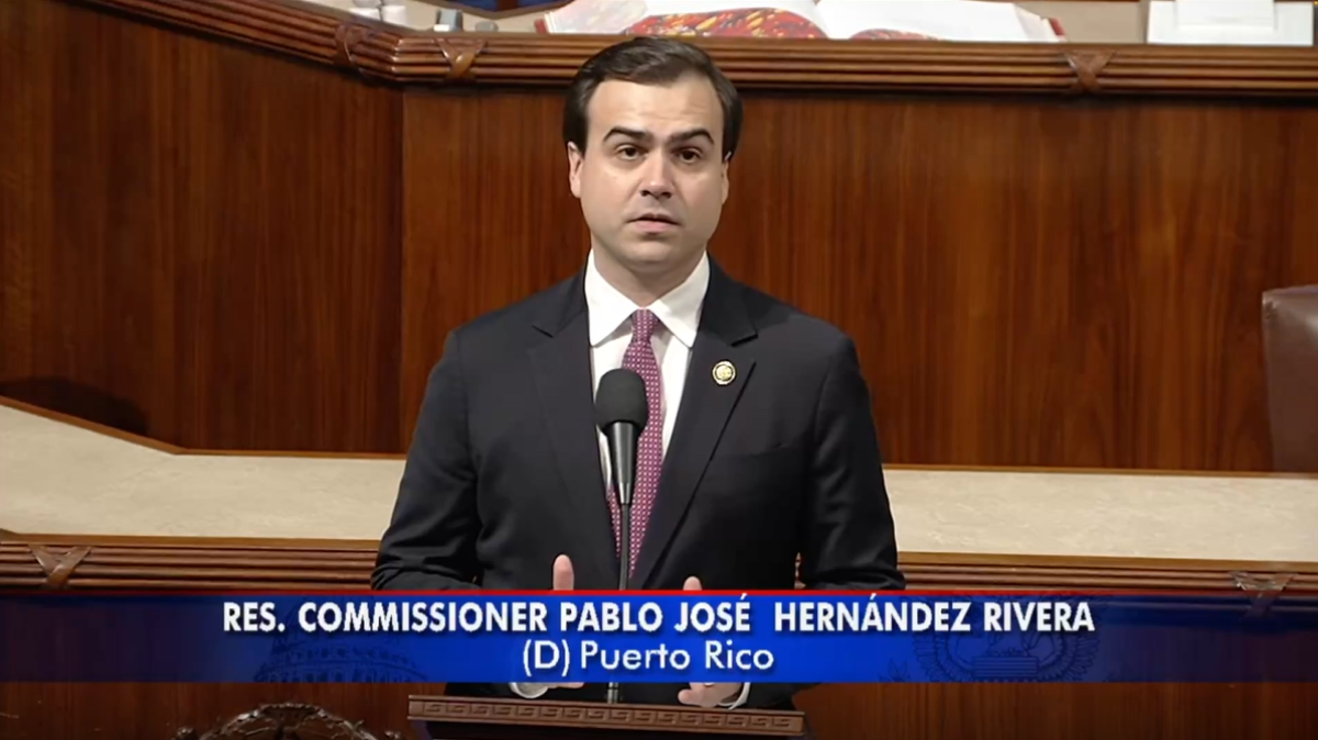Resident Commissioner delivering a speech in the floor of the U.S. House of Representatives