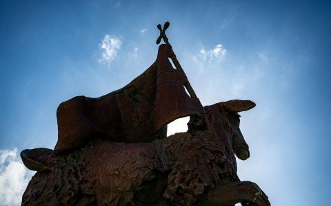 Lamb holding the flag of Saint John the Baptist, patron saint of Puerto Rico
