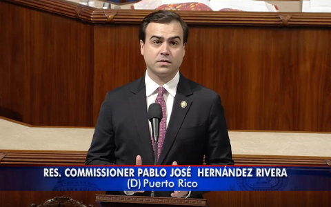 Resident Commissioner delivering a speech in the floor of the U.S. House of Representatives